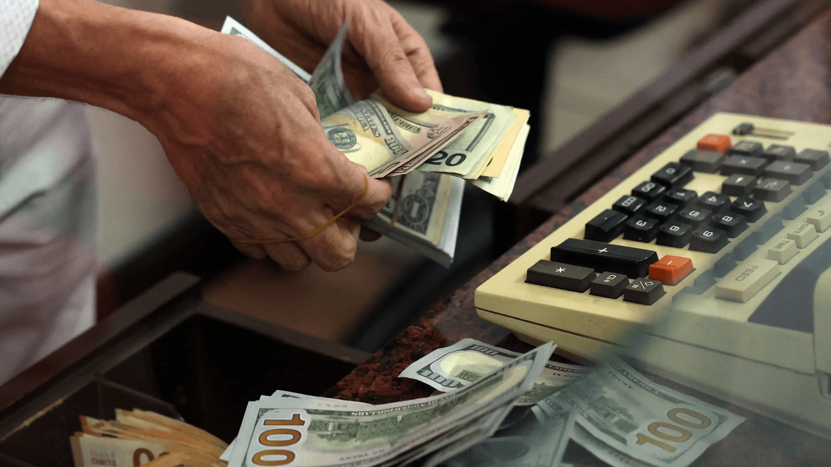 Dollar set for fourth weekly gain as investors balk at array of risks